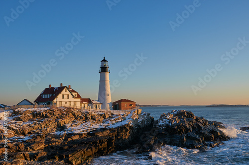 Winter sunrise on the famous Portland Head Lighthouse on the Maine Coast 