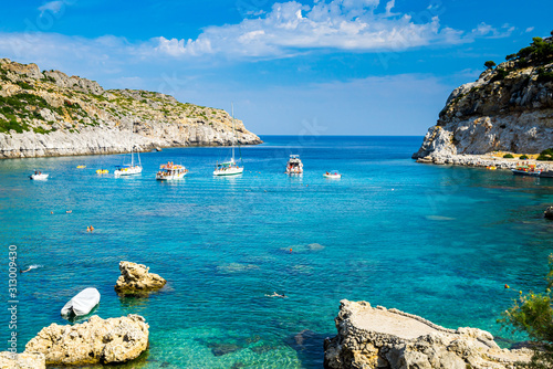 Beautiful turquoise water at Anthony Quinn Bay Rhodes Island Rodos Greece Europe photo