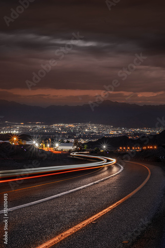 highway long exposure vehicle light trails curvy highway between mountains eilat israel 