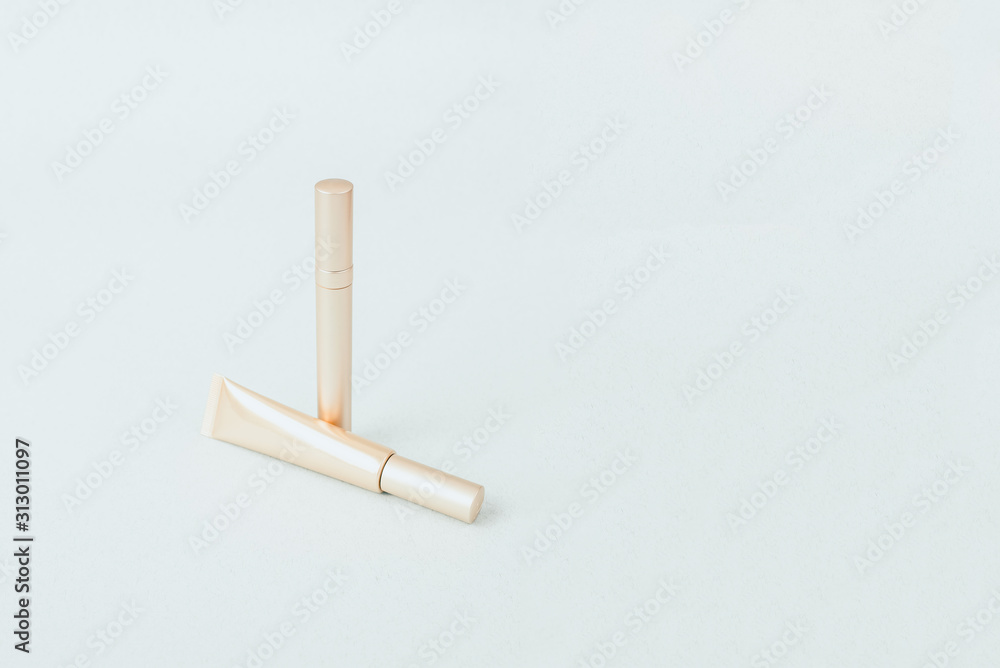 Different golden mascara on a pastel blue background, pattern. Collection of decorative mascara Different golden mascara on a pastel blue background, pattern. Collection of decorative mascara