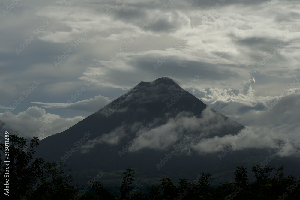Arenal Volcano With Clouds Blue Sky Sunset