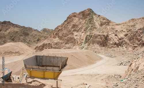 abandoned industrial object of digging factory in desert quarry nature space