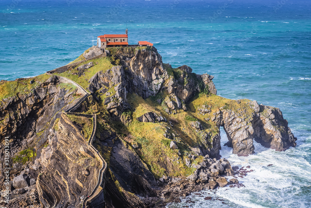View on the hermitage dedicated to Saint John the Baptist on a rocky Gaztelugatxe islet in Biscay region of Spain