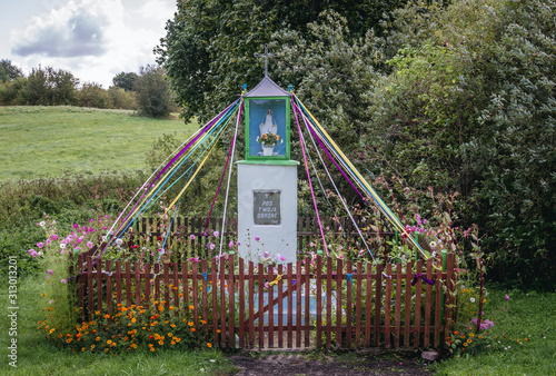 Fototapeta Naklejka Na Ścianę i Meble -  Ostroda, Poland - September 14, 2019: Small Roman Catholic shrine near Ostroda town