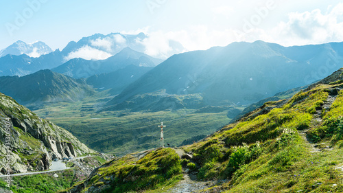 Fototapeta Naklejka Na Ścianę i Meble -  View from the Great Saint Bernard Pass, on the green mountain pastures of Valais, Alps, Switzerland