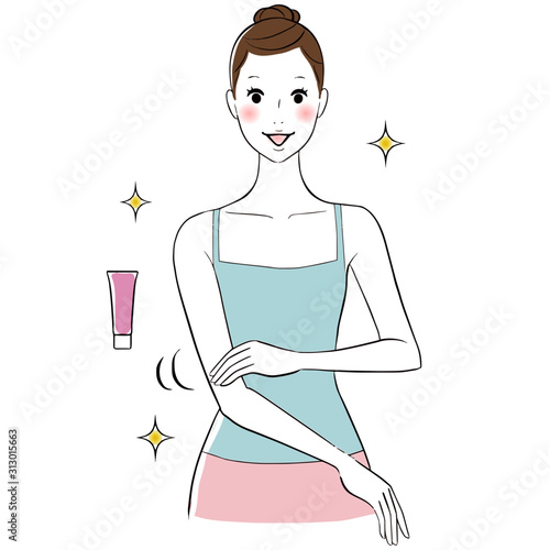 腕にクリームを塗る　女性