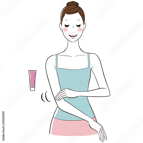 腕にクリームを塗る　女性