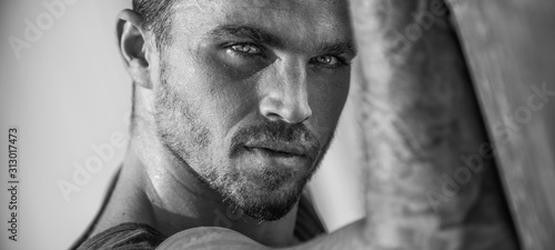 Handsome and fit Caucasian male on the beach