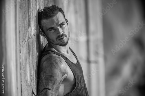 Handsome and fit Caucasian male on the beach