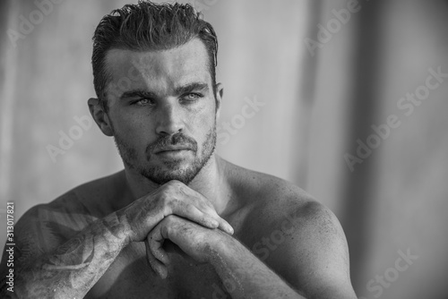 Handsome and fit Caucasian male on the beach
