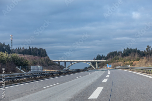 empty highway with modern bridge photo