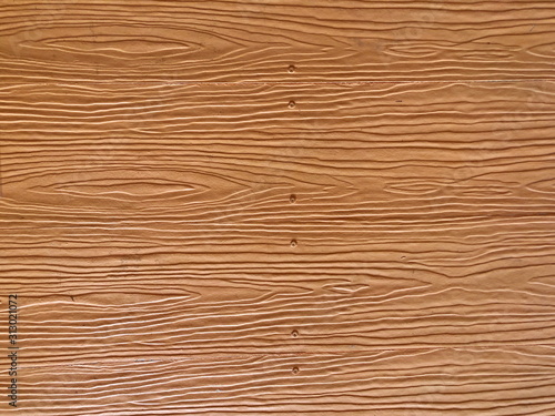 Texture background of brown artificial wood board 