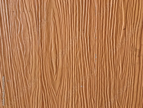 Texture background of brown artificial wood board 