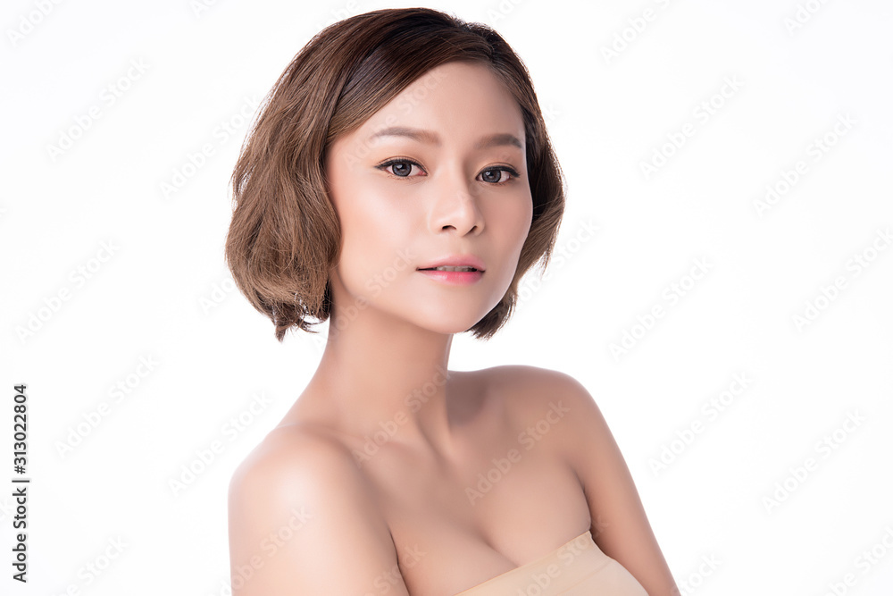 Beautiful Young Asian Woman with Clean Fresh Skin. Face care, Facial treatment, on white background, Beauty and Cosmetics Concept. Beautiful Young Asian Woman with Clean Fresh Skin. Face care, Facial treatment, on white background, Beauty and Cosmetics Concept.