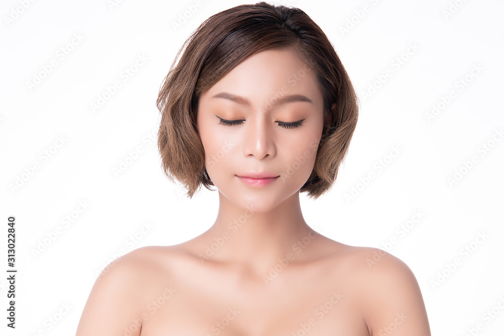 Beautiful Young Asian Woman with Clean Fresh Skin. Face care, Facial treatment, on white background, Beauty and Cosmetics Concept. Beautiful Young Asian Woman with Clean Fresh Skin. Face care, Facial treatment, on white background, Beauty and Cosmetics Concept.
