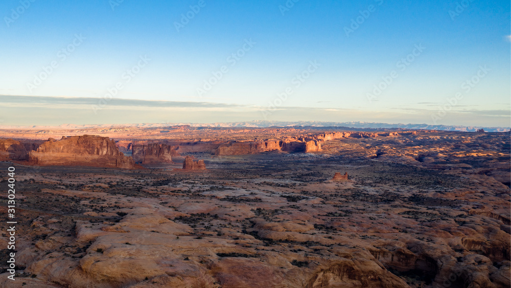 Aerial view sunrise in Moab showing buttes and pinnacles