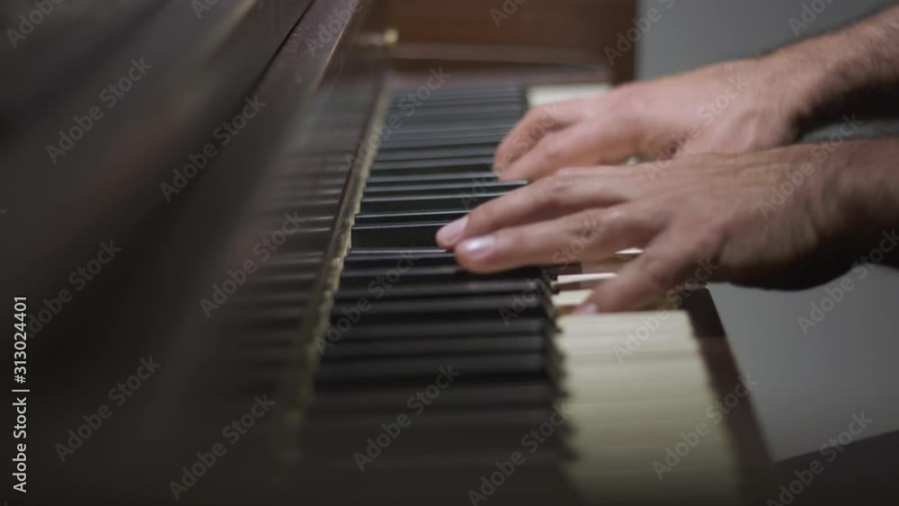 Close-up of hands playing the piano Close-up of hands playing the piano