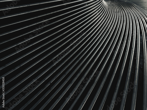 abstract metal background. rounded thin metal tubes