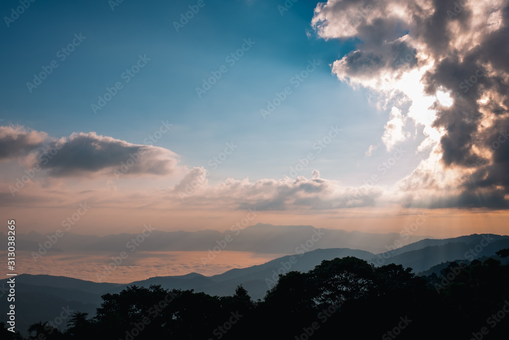 Fotografie Sunrise scene over the high mountain.