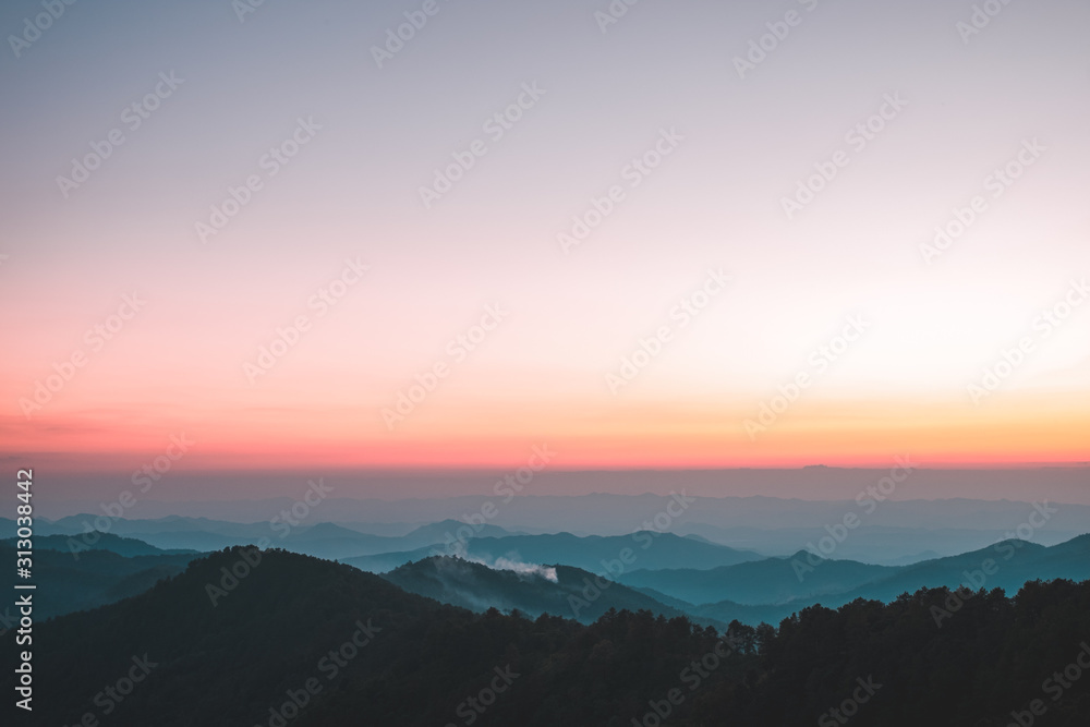 Landscape view of the mountain peaks at sunset.