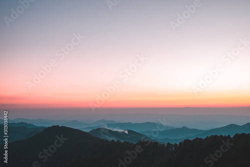 Landscape view of the mountain peaks at sunset.