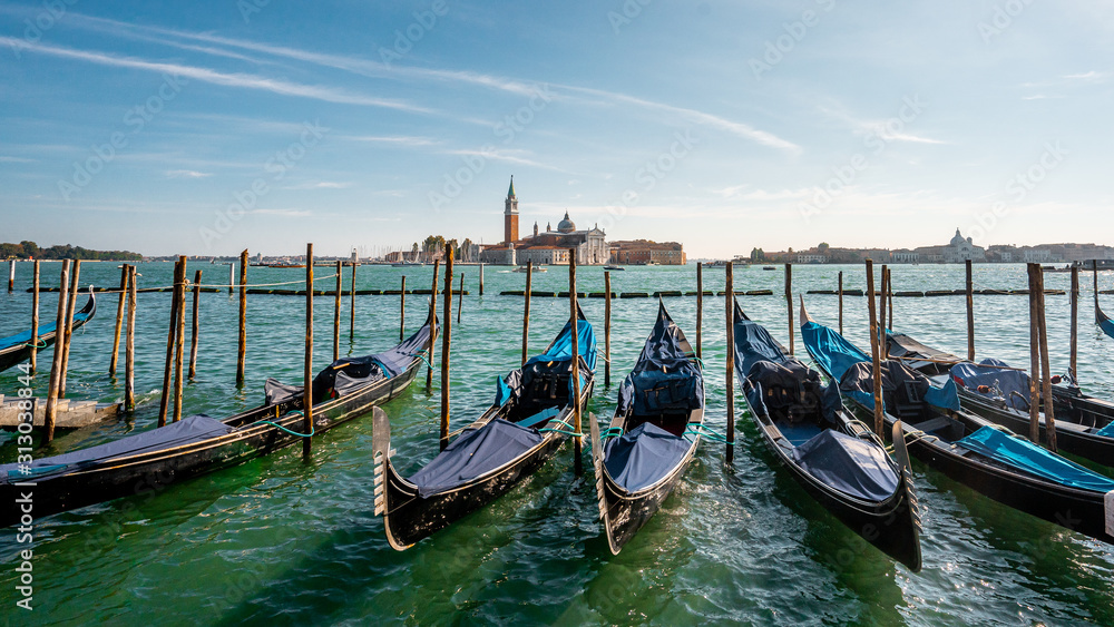 View of Gondolas near Piazza San Macro  . The main sqaure and landmarks in Venice at noon before autumn season , Venice , Italy