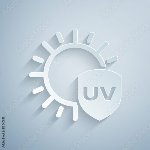 Paper cut UV protection icon isolated on grey background. Sun and shield. Ultra violet rays radiation. SPF sun sign. Paper art style. Vector Illustration