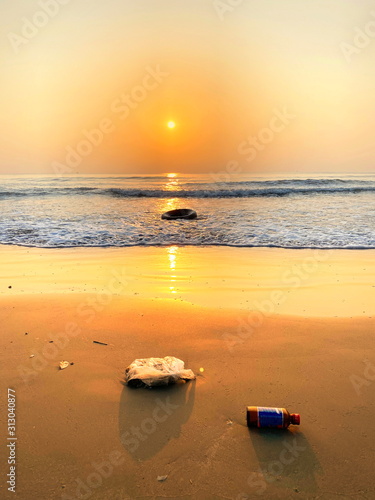 Wallpaper Mural Plastic waste on beaches shows environmental pollution.Garbage on a beach, environmental pollution concept picture. Torontodigital.ca