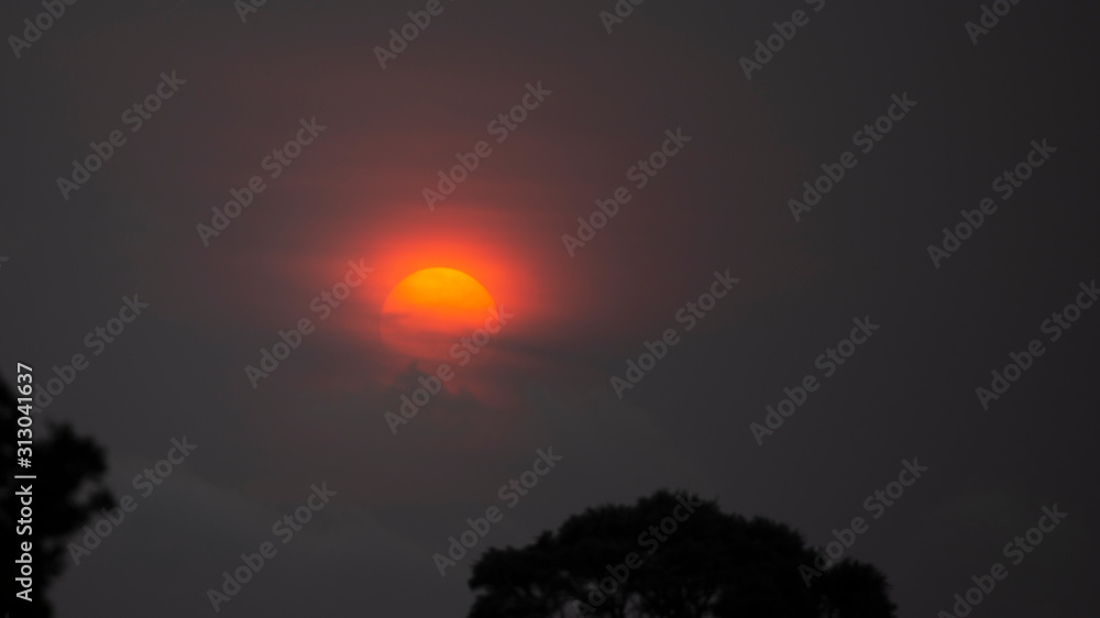 Auckland red sunset with smoky clouds from Australia bush fire Auckland red sunset with smoky clouds from Australia bush fire
