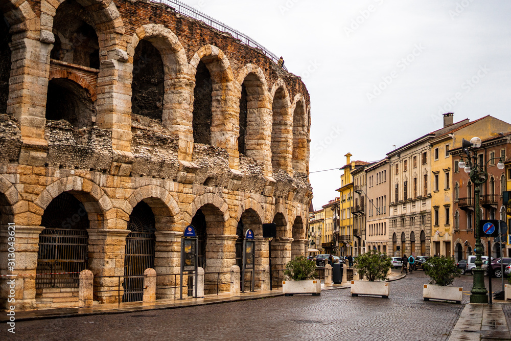 View of Verona Arena in rainy day . One of the classical building from Roman Era locate in the old town of Verona , Veneto , Italy