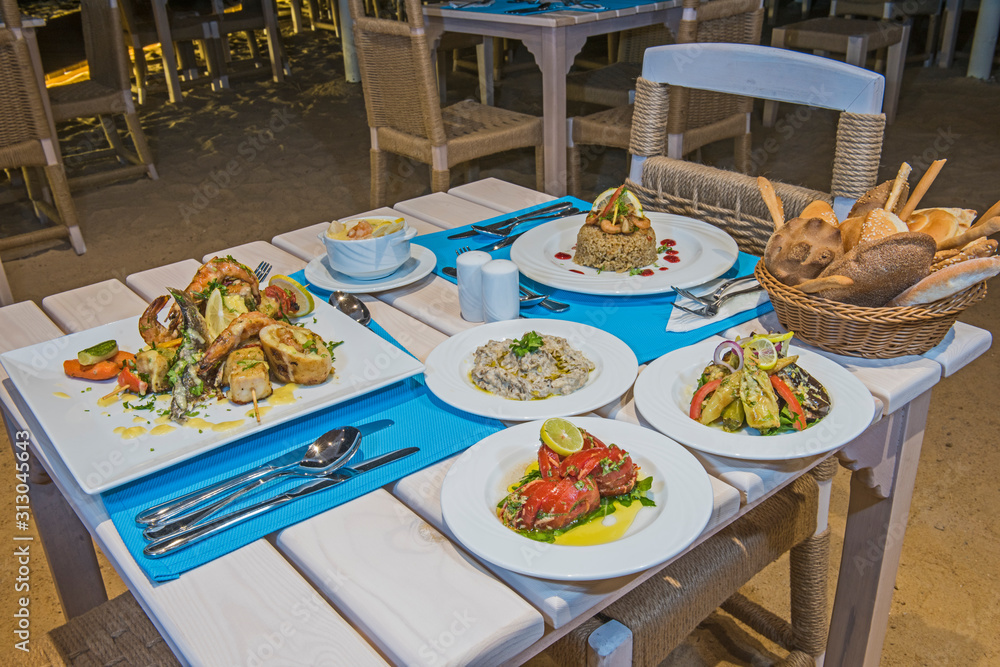 Seafood meal setting in a la carte outdoor restaurant