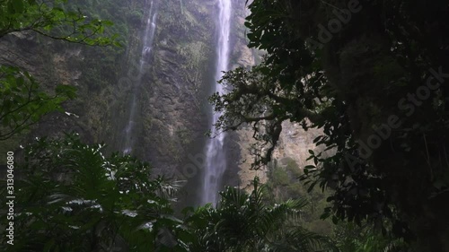 Wide shot of the amazing Gocta waterfall in the Amazon forest located in Chachapoya, Peru. photo