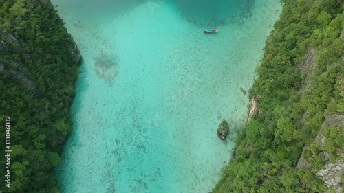 boats over maya bay drone shot above thailands famous maya bay tropical waters photo