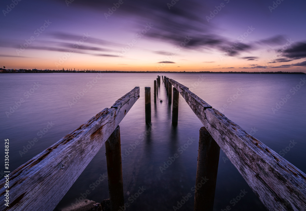 Fototapeta premium wooden pier at sunset