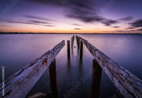 wooden pier at sunset