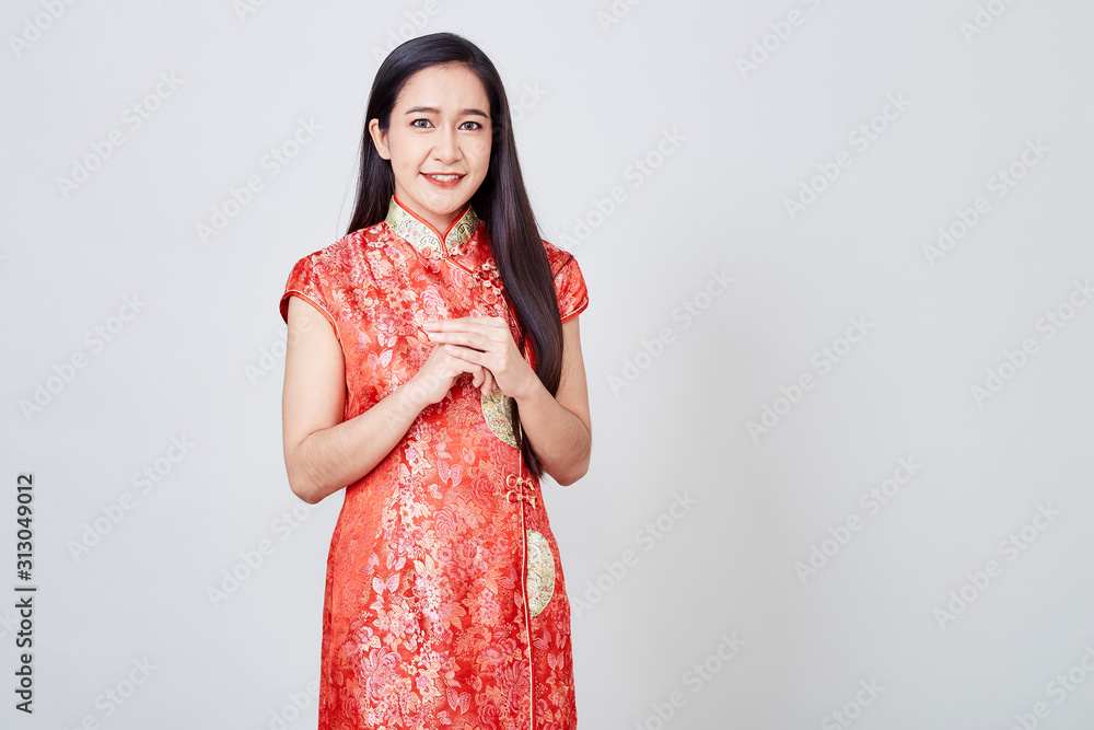 Asian woman in chinese dress traditional cheongsam Asian woman in chinese dress traditional cheongsam