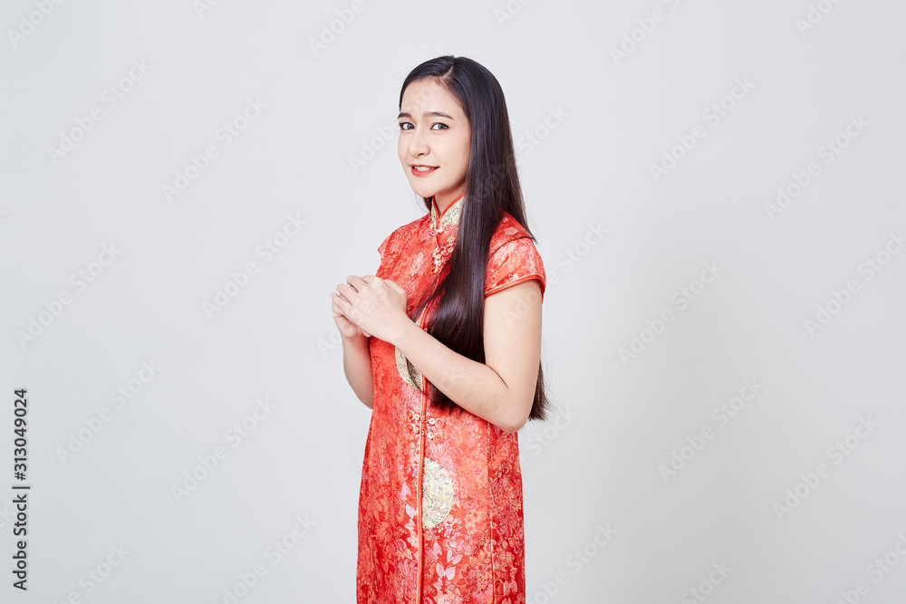 Asian woman in chinese dress traditional cheongsam Asian woman in chinese dress traditional cheongsam