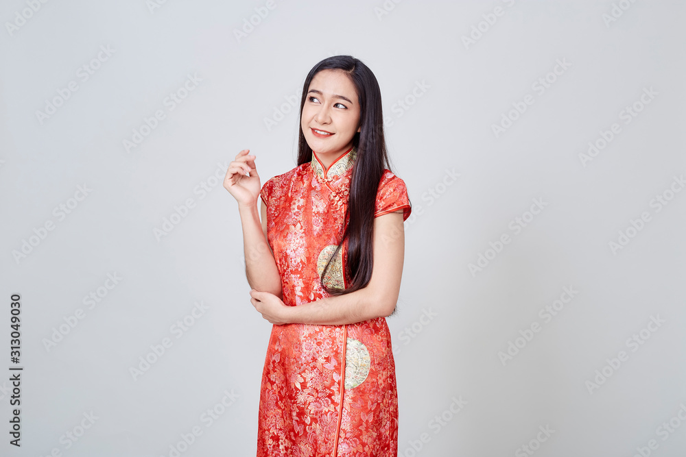Asian woman in chinese dress traditional cheongsam Asian woman in chinese dress traditional cheongsam