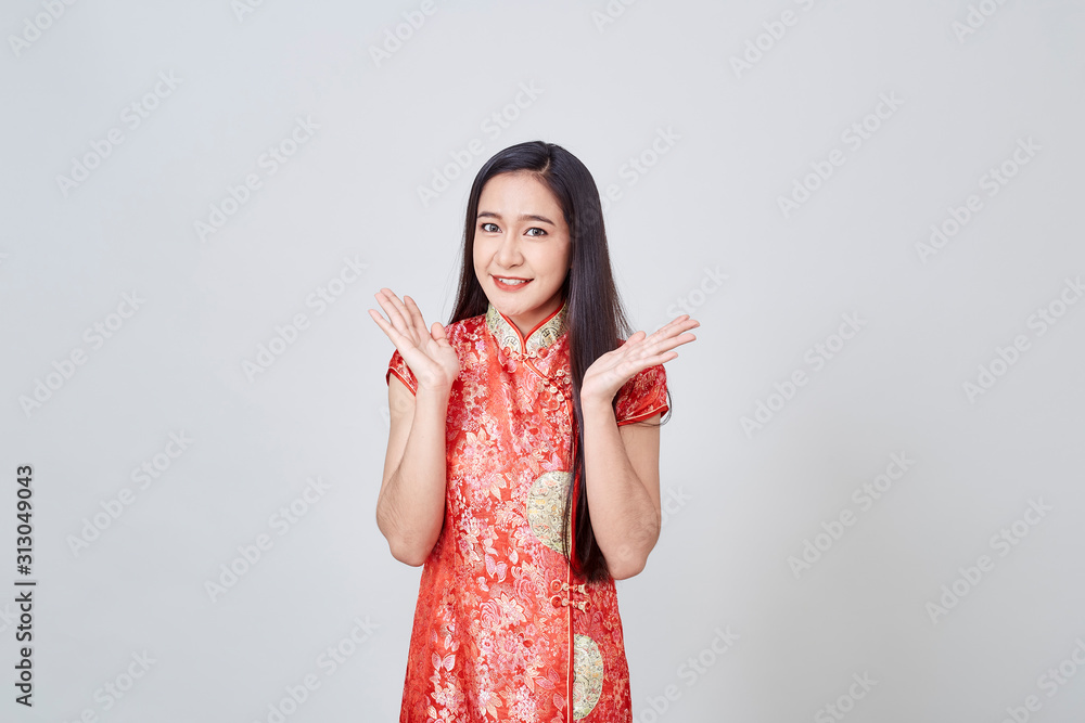 Asian woman in chinese dress traditional cheongsam Asian woman in chinese dress traditional cheongsam