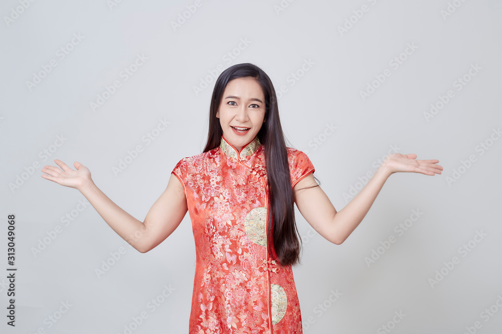 Asian woman in chinese dress traditional cheongsam Asian woman in chinese dress traditional cheongsam