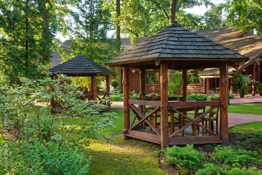 Wooden pavillion in recreation area, outdoor activities background Wooden pavillion in recreation area, outdoor activities background