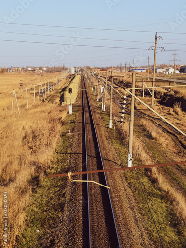 Plot railway. Top view on the rails. High-voltage power lines for electric trains