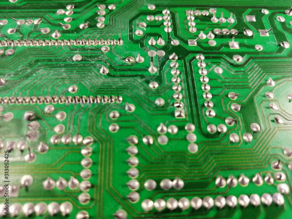 beautiful industrial surface background of an old soldered circuit board beautiful industrial surface background of an old soldered circuit board