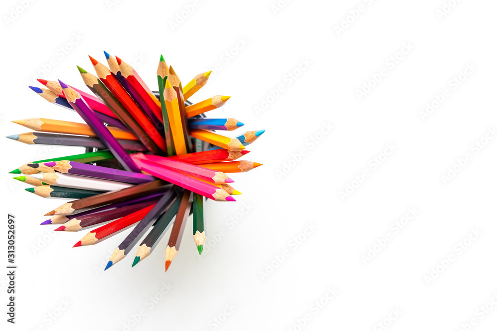 Colour pencils on white background close up Colour pencils on white background close up