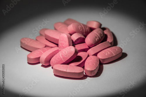 Close-up photo of some pink pills