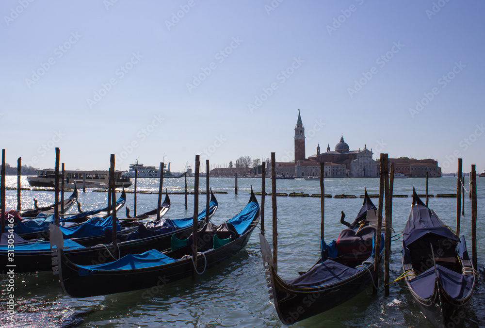 Empty gondolas are waiting for tourists