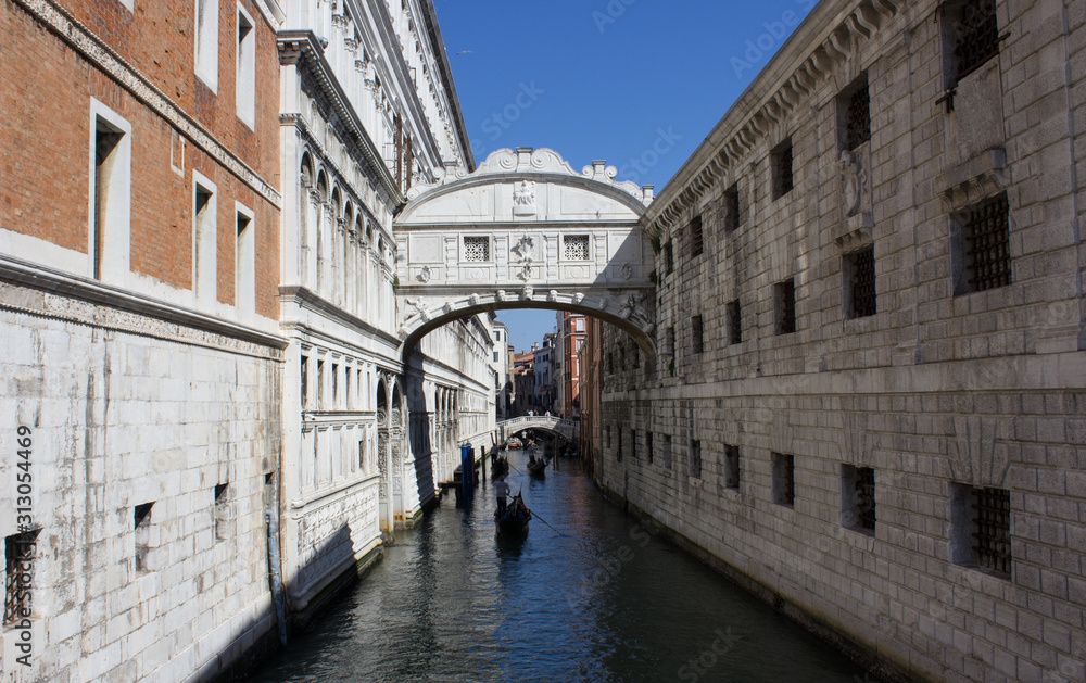 A typical narrow street in Venice, where you can only move on water