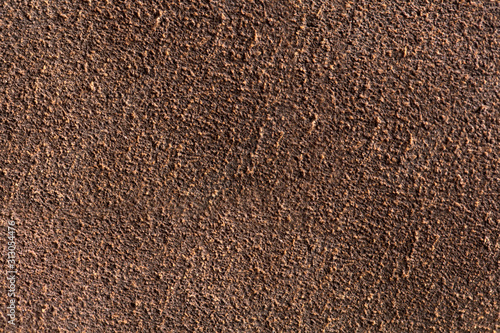 Background macro texture of suede brown leather.