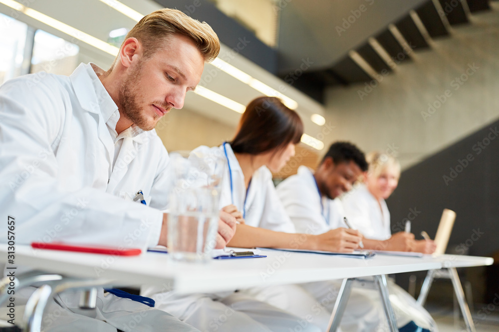 Medicine students write a test
