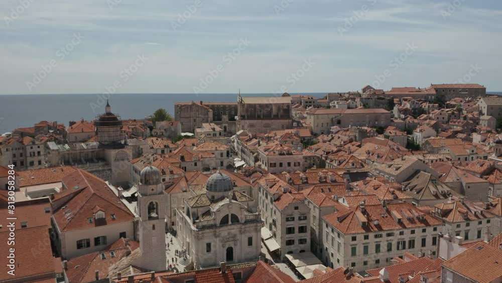 Fly over Old Town Dubrovnik in Croatia with view of Church and city square. Fly over Old Town Dubrovnik in Croatia with view of Church and city square.